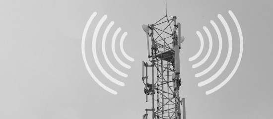 Cell tower emitting radio waves (wireless signal illustration)